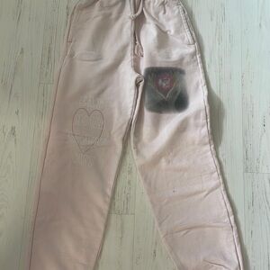 light pink boys lie sweatpants. have alittle blue due on top but worn a few time